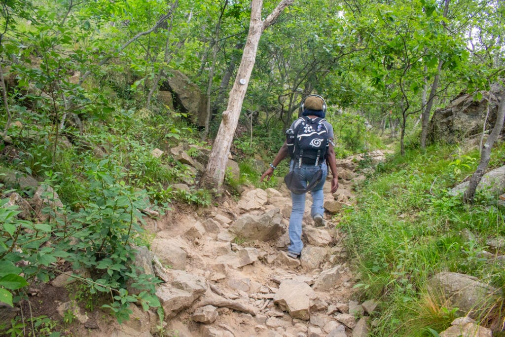 nature photography hiking up a rocky trail